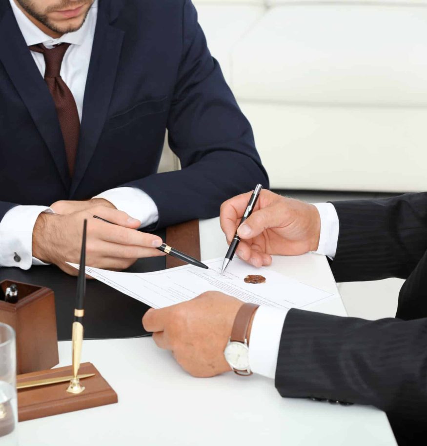 Notary,With,Client,In,Office